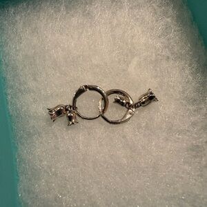 3 pairs of sterling Silver Ring Earrings with flower and cube accents.